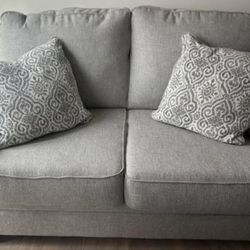 Loveseat with Throw Pillows