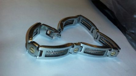 Polished stainless steel and14k gold link bracelet