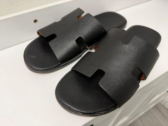 Men’s Slide Sandal– Size 45 – Good Condition  * Comfortable slip-on slide sandals * Black with yellow lettering * Size 45 * Good used condition * Clea