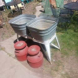 Old antique metal wash tubs good Garden item