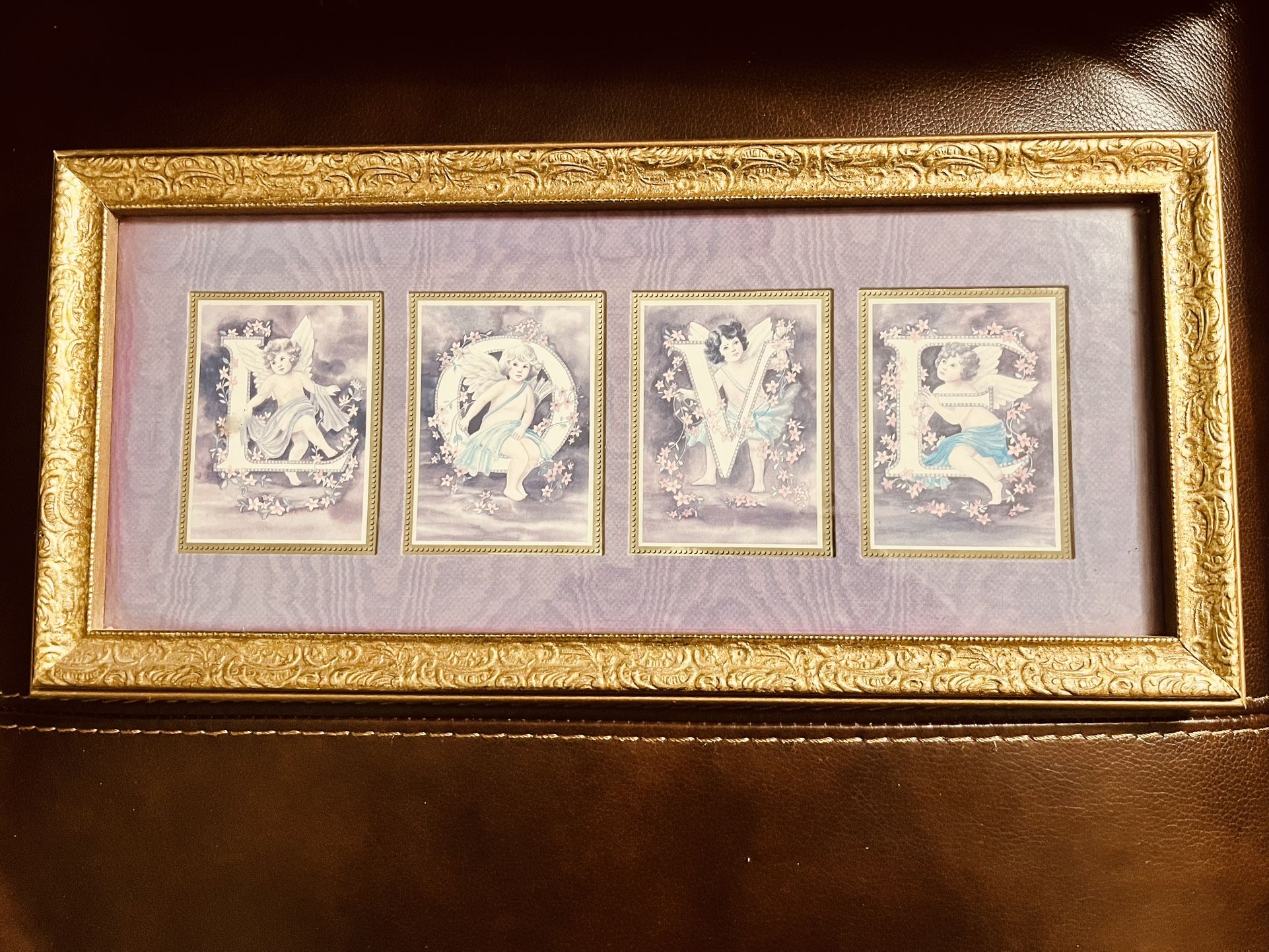 PRETTY PRINT IN FRAME “LOVE”EACH LETTER HAS IT'S OWN WINDOW FAUX SILK PRINT ON THE cardboard MAT GOLD ANTIQUED COLOR FRAME