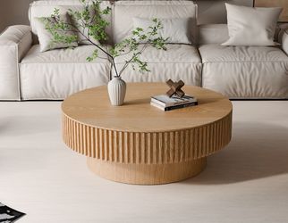 Brand New 40' circular Coffee table with hidden storage and flutted wood
