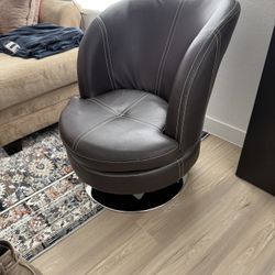 Pair Of Leather Swivel Chairs