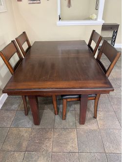 Table and four chairs