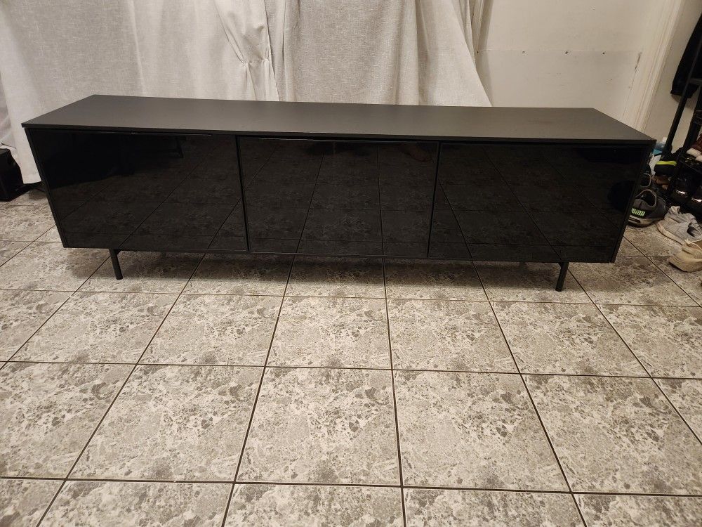 TV stand RANNÄS
TV unit with doors, black/black glass, 70 1/8x16 1/2 "