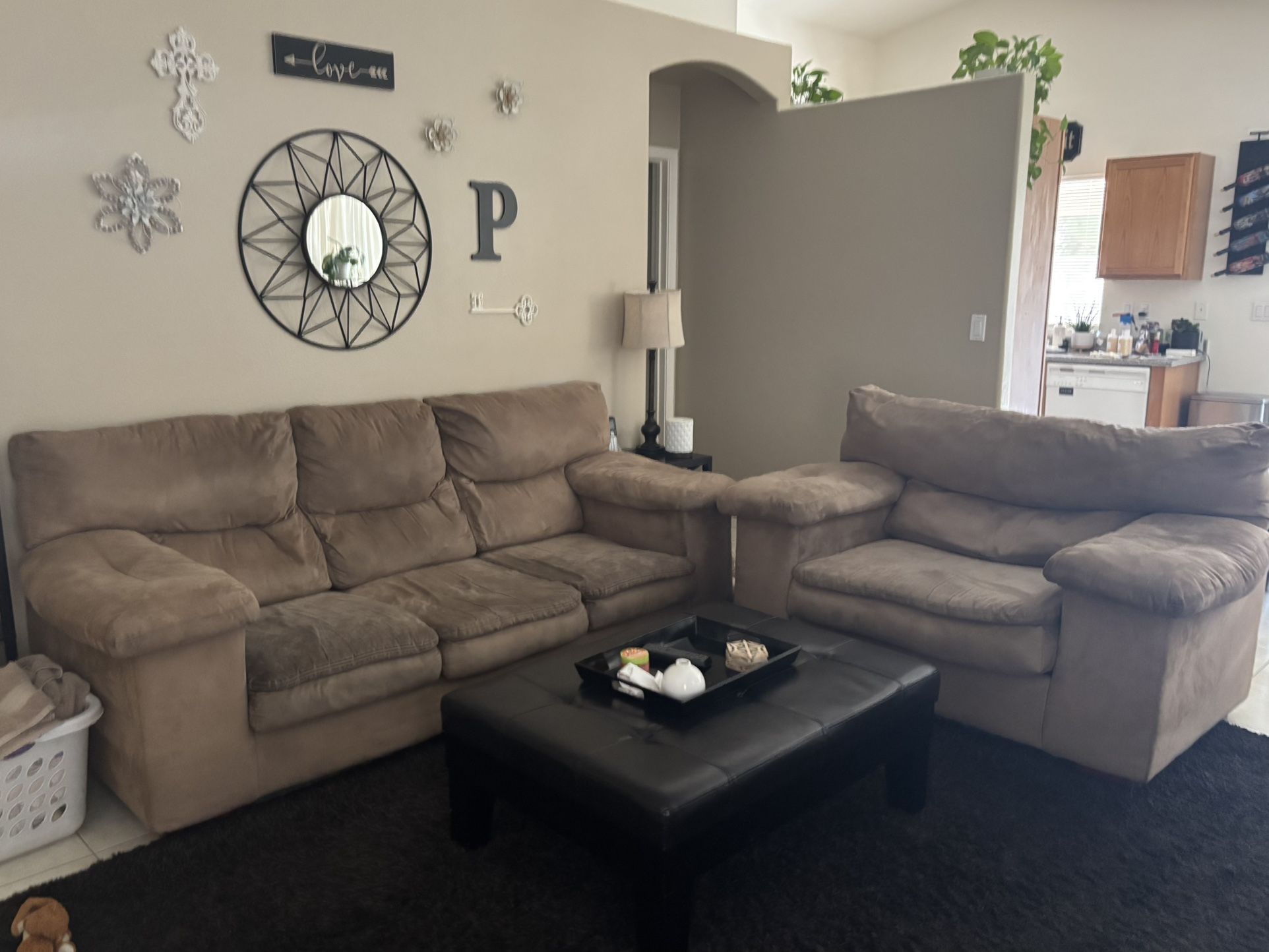 Tan Couch And Oversized Chair