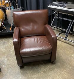 Three leather-faced chairs. Beautiful, stylish, in great condition.