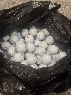 100 used simulator golf balls