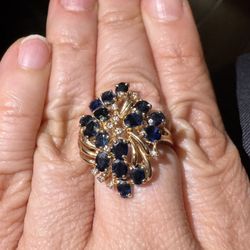 14kt Gold With (16) Blue sapphires And Diamonds.