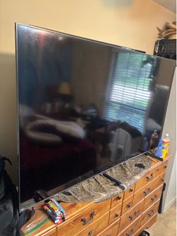 Samsung 70" Class Q60B QLED 4K Smart TV.