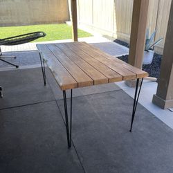 Wood table with hairpin legs, (6’ x 3’, 30” height), with rubber footpads. Already Disassembled.  In good condition.