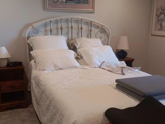 Full size bed with mattress box spring pillows and bedding