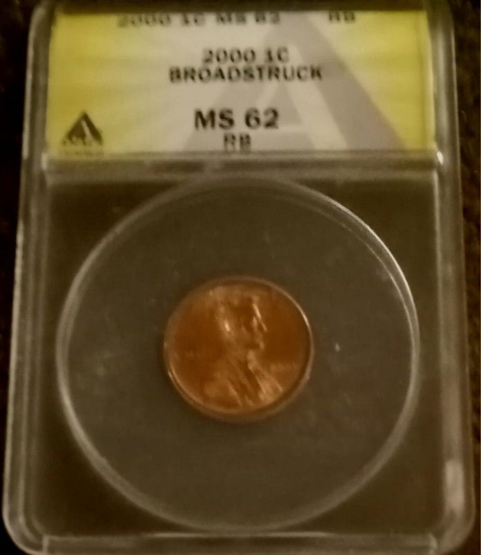 BROADSTRUCK ERROR PENNY, GRADED 62