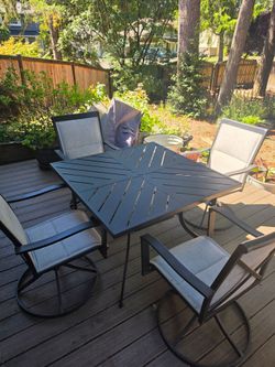 Like new, patio table and chairs.