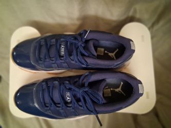Used pairs of the Air Jordan 11 Retro Low "Navy Gum size 13