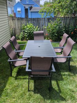 Black steel outdoor\patio table and 6 chairs