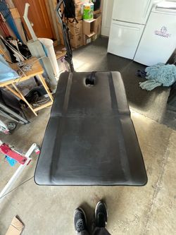 Massage table