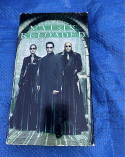 Two Kernu Reeves - Matrix Reloaded and Johnny Mnemonic VHS movies both for $20.00