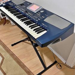 Korg PA500 Keyboard With A Stand. 