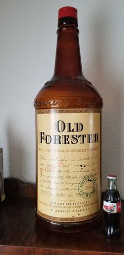 Old Forester back bar advertising bottle.