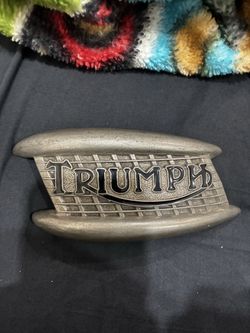 Triumph belt buckle Johnson motors made in California