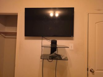 Tv with floating stand
