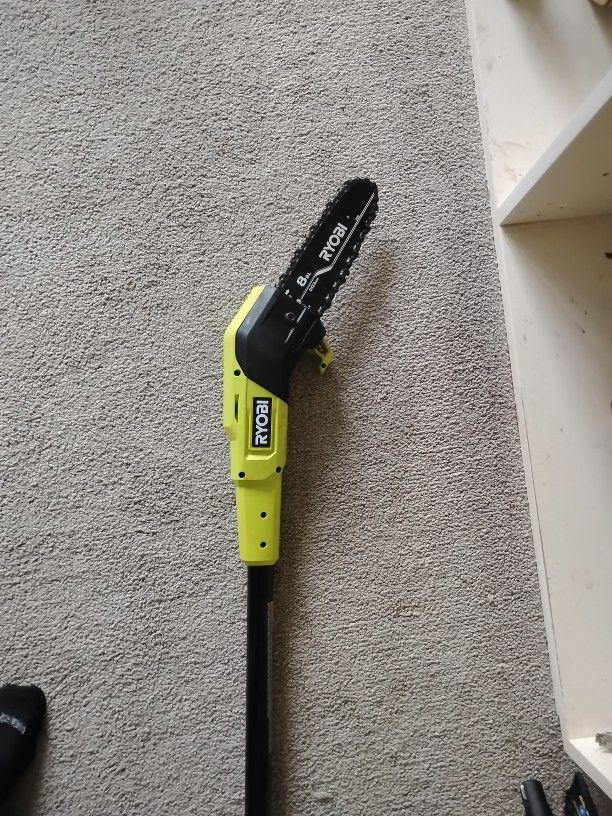 Ryobi Chainsaw On Stick 18v 1 Battery Plus Charger . Used Twice