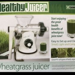Wheat grass juicer