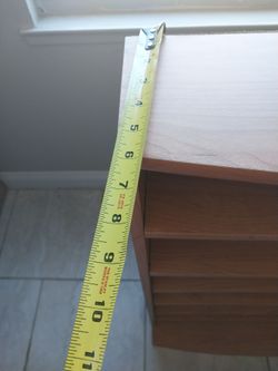 Cherry wood shelving unit.