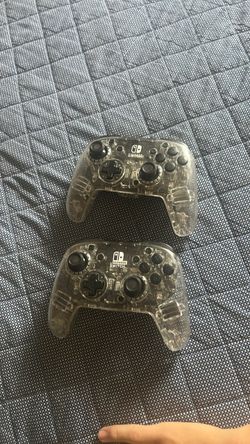 Two PDP Afterglow Wireless RGB Gaming Controller for Nintendo Switch