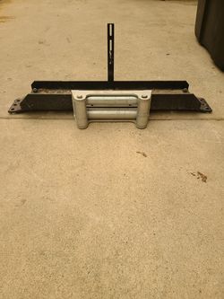 Winch mount, roller fairlead. Fits jeep wrangler 94 . Just remove plastic piece between bumper and front of jeep. Bolts directly to frame.