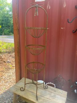 Wrought iron plant basket stand