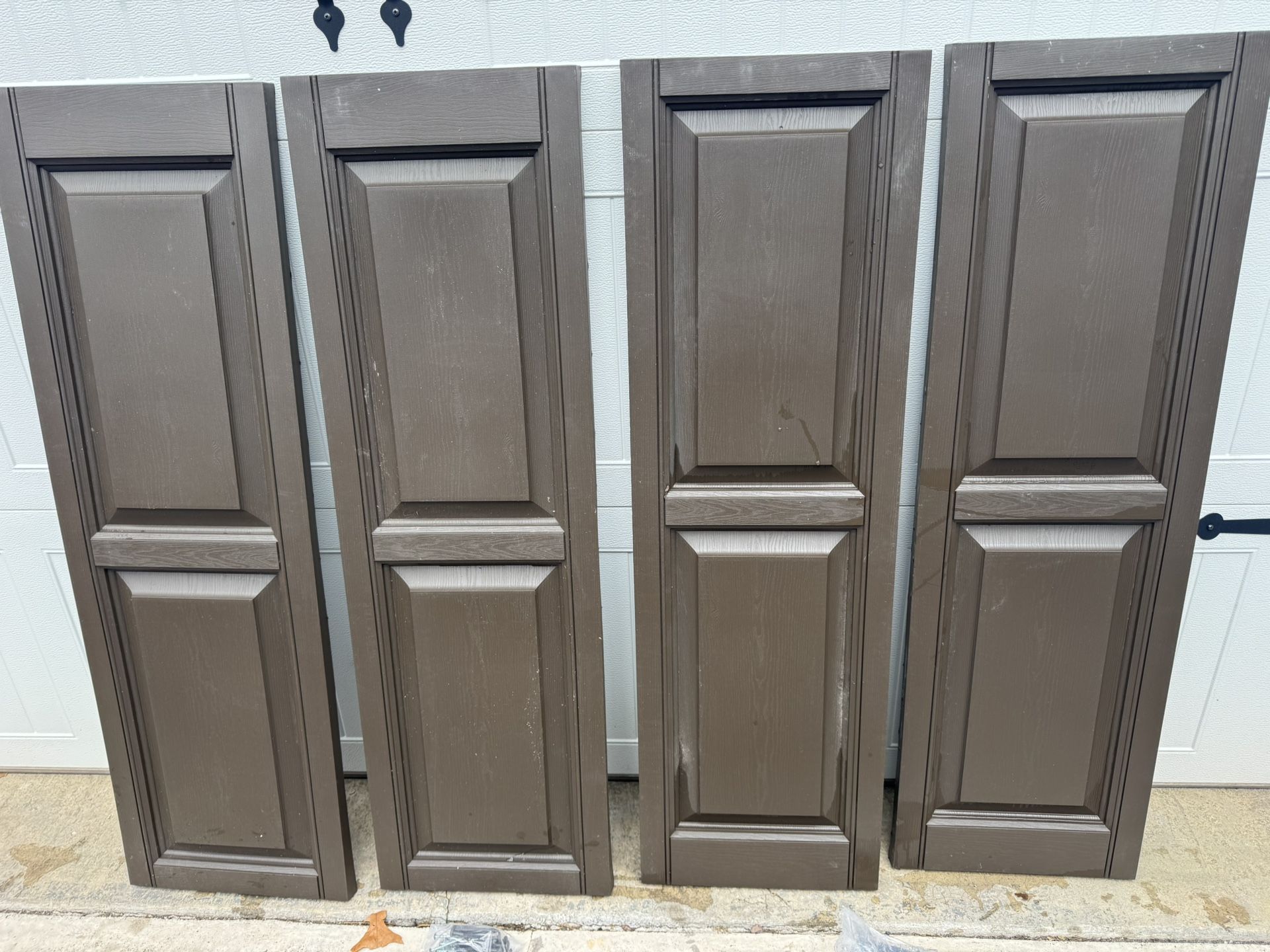 (2) Sets New Brown Vinyl Shutters 15” x 46 1/2”. $20 A Set. Must Pickup