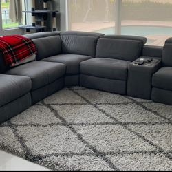 Dark grey reclining sofa/ electric