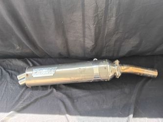 Vance & Hines exhaust muffler, dual-tip outlet with classic raised logo