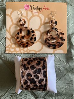Penelope Ann leopard print earrings and bracelet $15 cash only. Cross posted