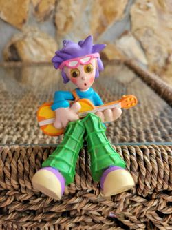 Purple Hair Guitarist Table Decor