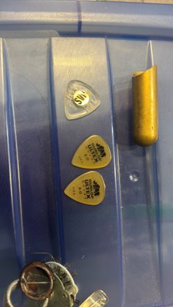 Guitar Pics And Finger Bra Sleeve