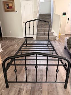 Black metal twin bed frame