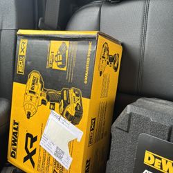 brand new half inch impact wrench with battery and charger in box