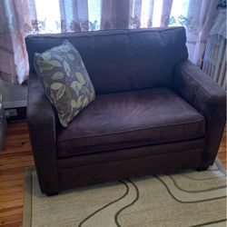 Beautiful chocolate color sofa bed barely used 300 or best offer