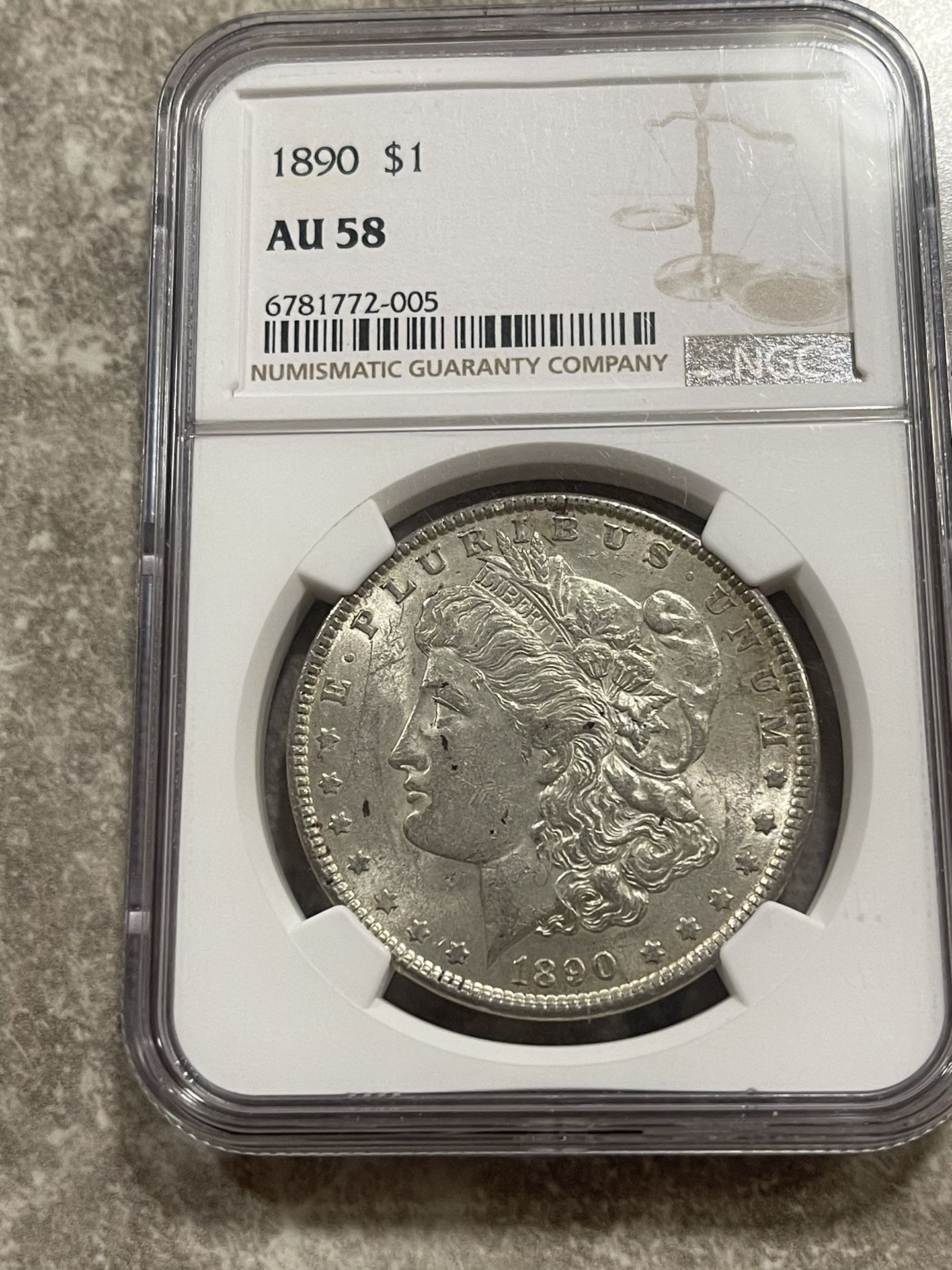 1890 Morgan Dollar AU58