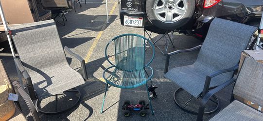 TWO SWIVEL TALL BACK PATIO CHAIRS