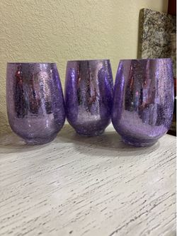 3 purple candle holders