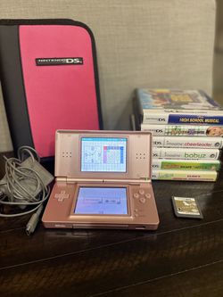 Nintendo DSI XL Console, charger (7) Game Bundle - video gaming
