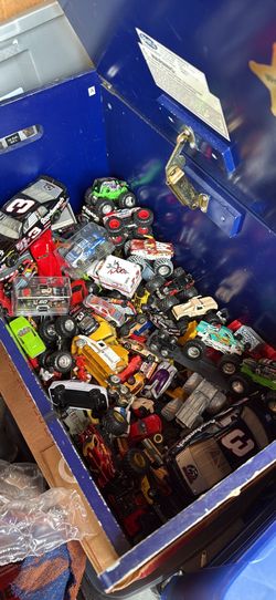 A lot of hot wheels and cars