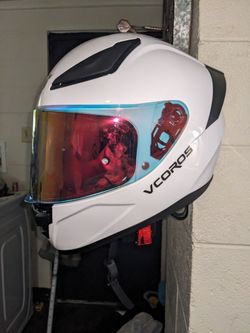 New in box XL motorcycle helmet W/clear  changeable visor  and wallpunt helmet stand
