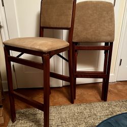 Two Suede And Wood Folding Bar Stools