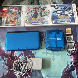 Blue Nintendo 3DS XL And Games