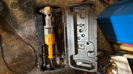 DeWalt DW124 1/2-inch heavy-duty corded right-angle drill sitting inside its original plastic storage case